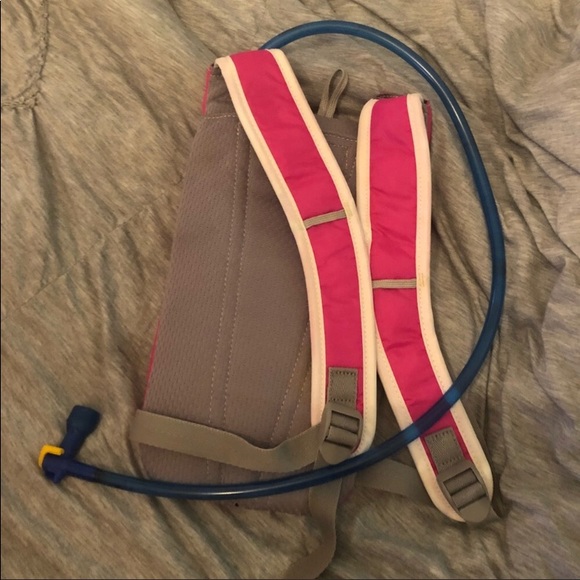 Pink camelbak never used. - Picture 2 of 4